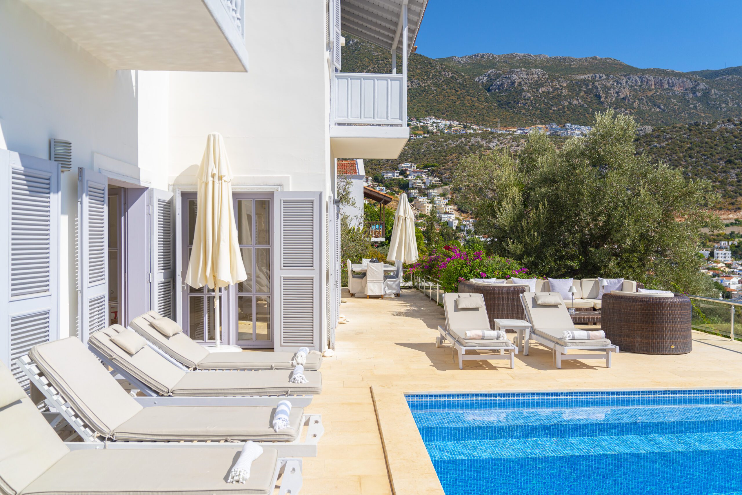 Outdoor pool and sun loungers in Villa Serin Ev, holiday villas in Kalkan, Turkey