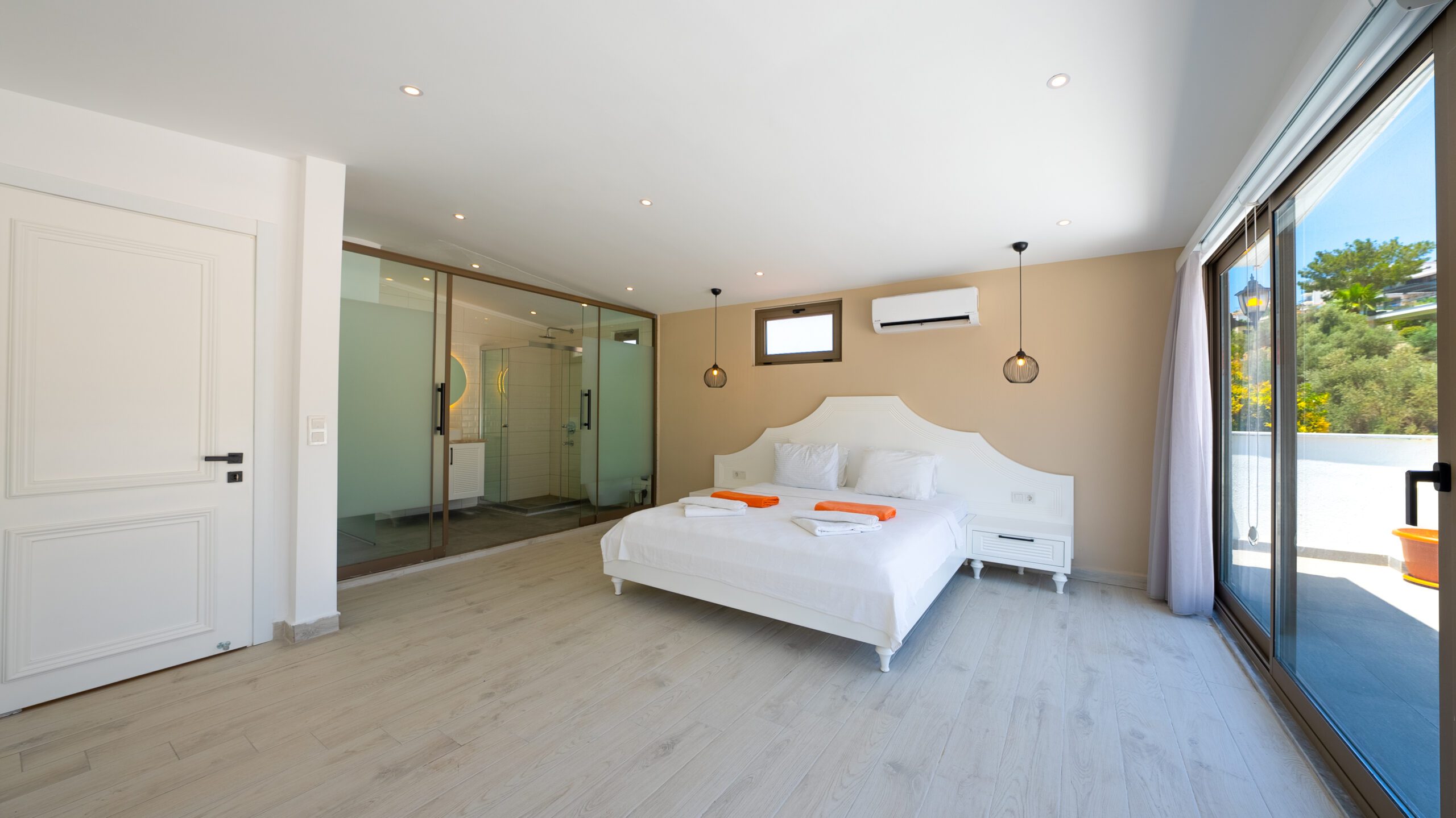 Double bedroom with bathroom and balcony in Villa Orange, villas to rent in Kalkan, Turkey