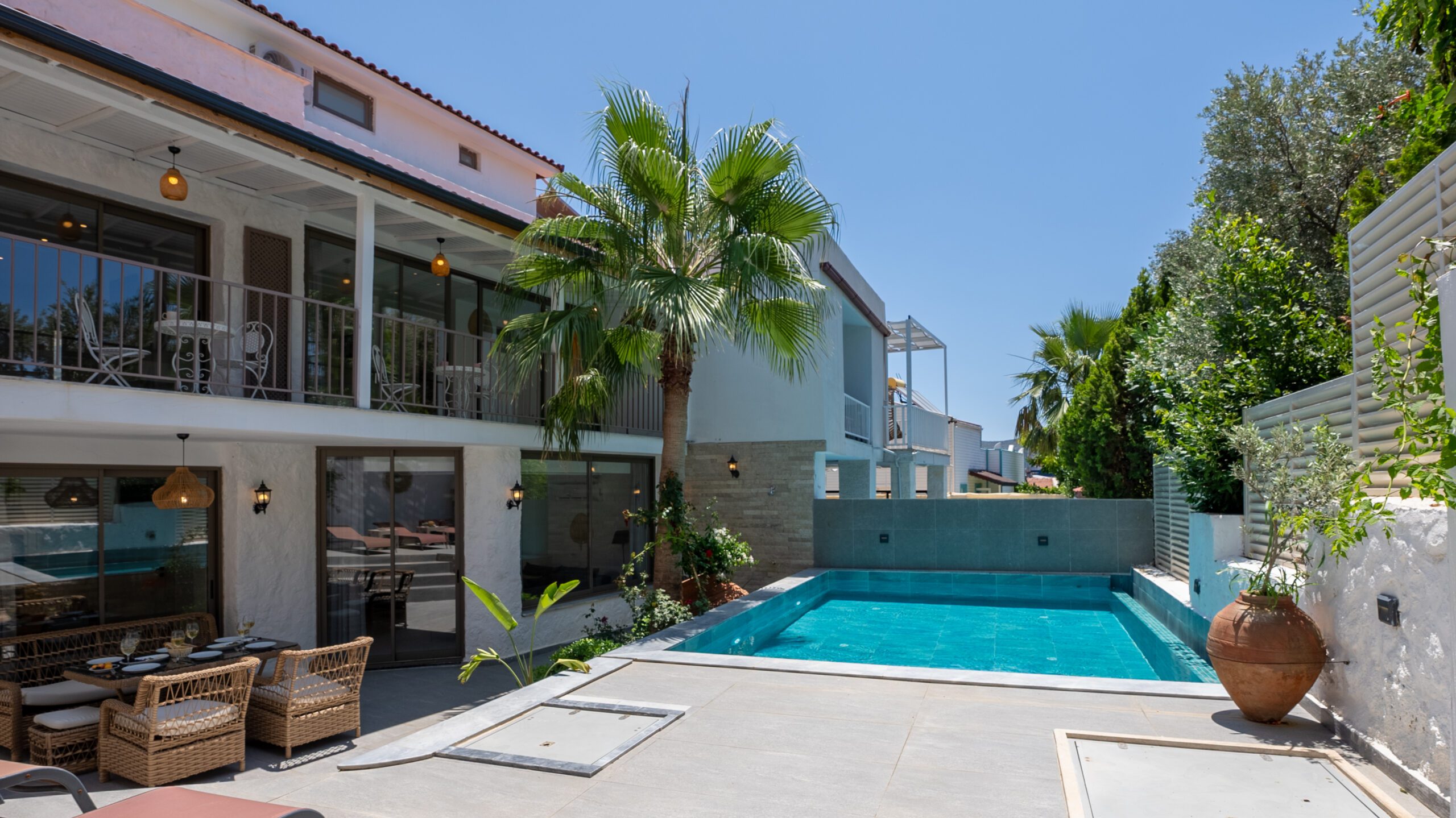 Outdoor pool and dining table in Villa Orange, villas to rent in Kalkan, Turkey