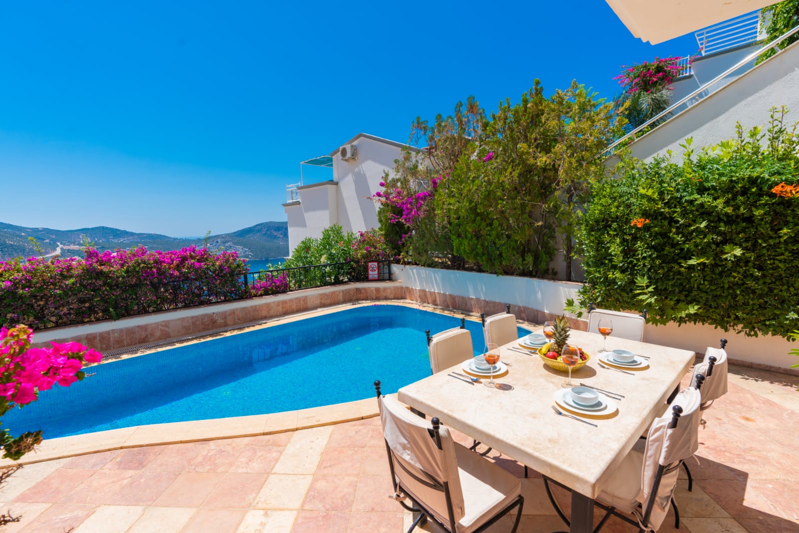 Outdoor pool and dining table at Villa Salice, villa holidays in Kalkan, Turkey
