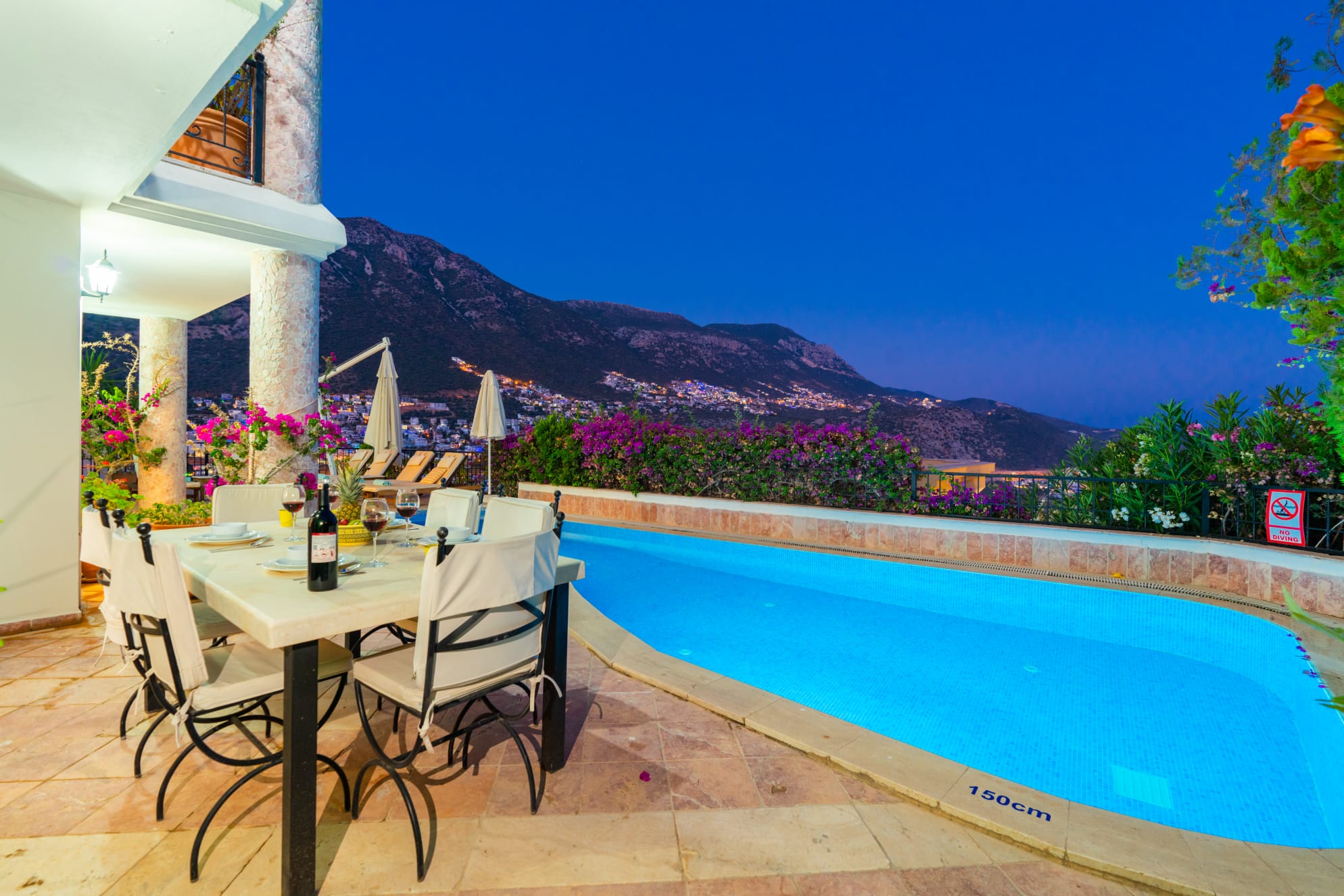 Outdoor pool and dining table in Villa Salice, villa holidays in Kalkan, Turkey