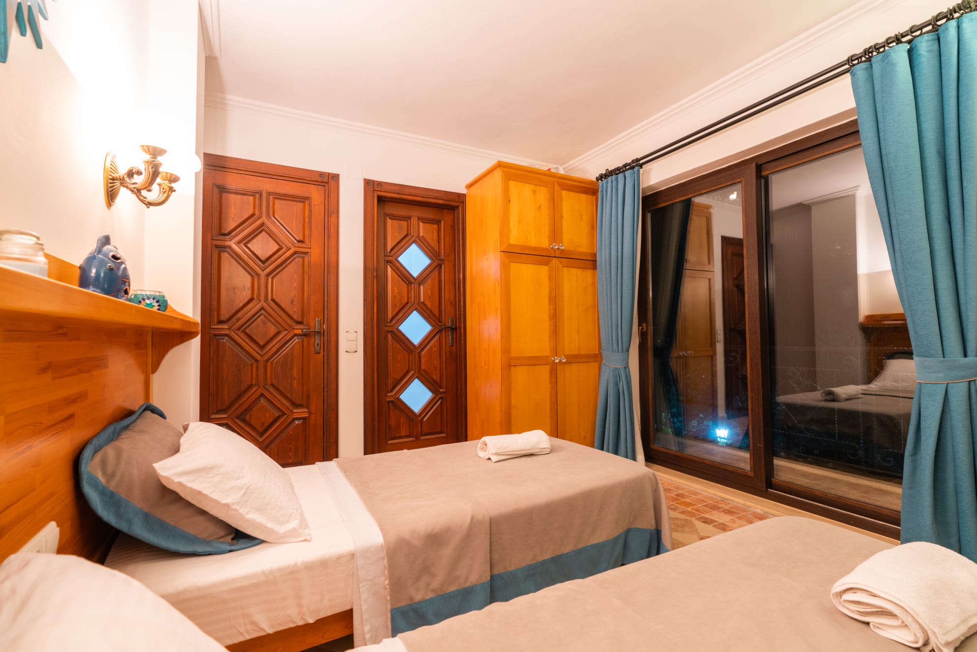 Twin bedroom with bathroom and balcony in Villa Salice, villa holidays in Kalkan, Turkey