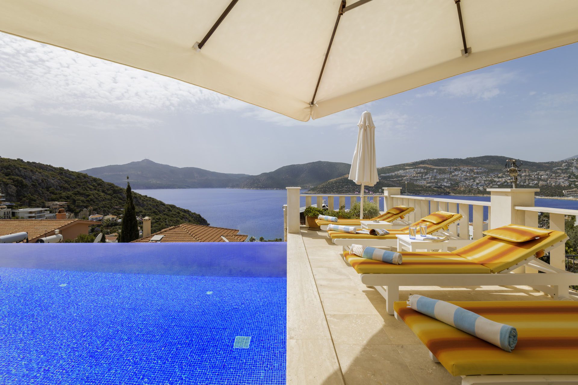 Infinity pool with sun loungers at Villa Ketchy, villas to rent in Kalkan, Turkey