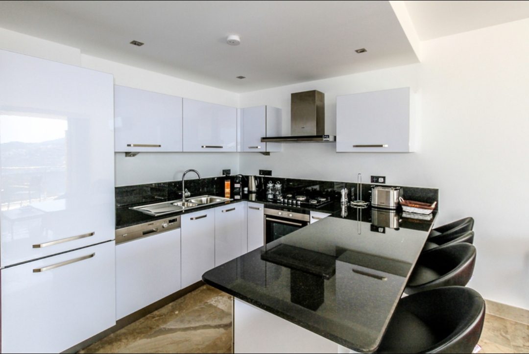 Kitchen with breakfast bar in Zenato Apartment, villas to rent in Kalkan, Turkey