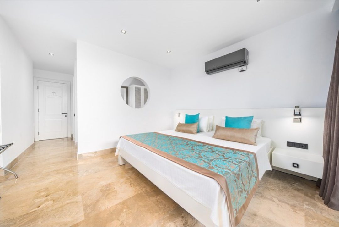 Double bedroom and bathroom in Zenato Apartment, villas to rent in Kalkan, Turkey