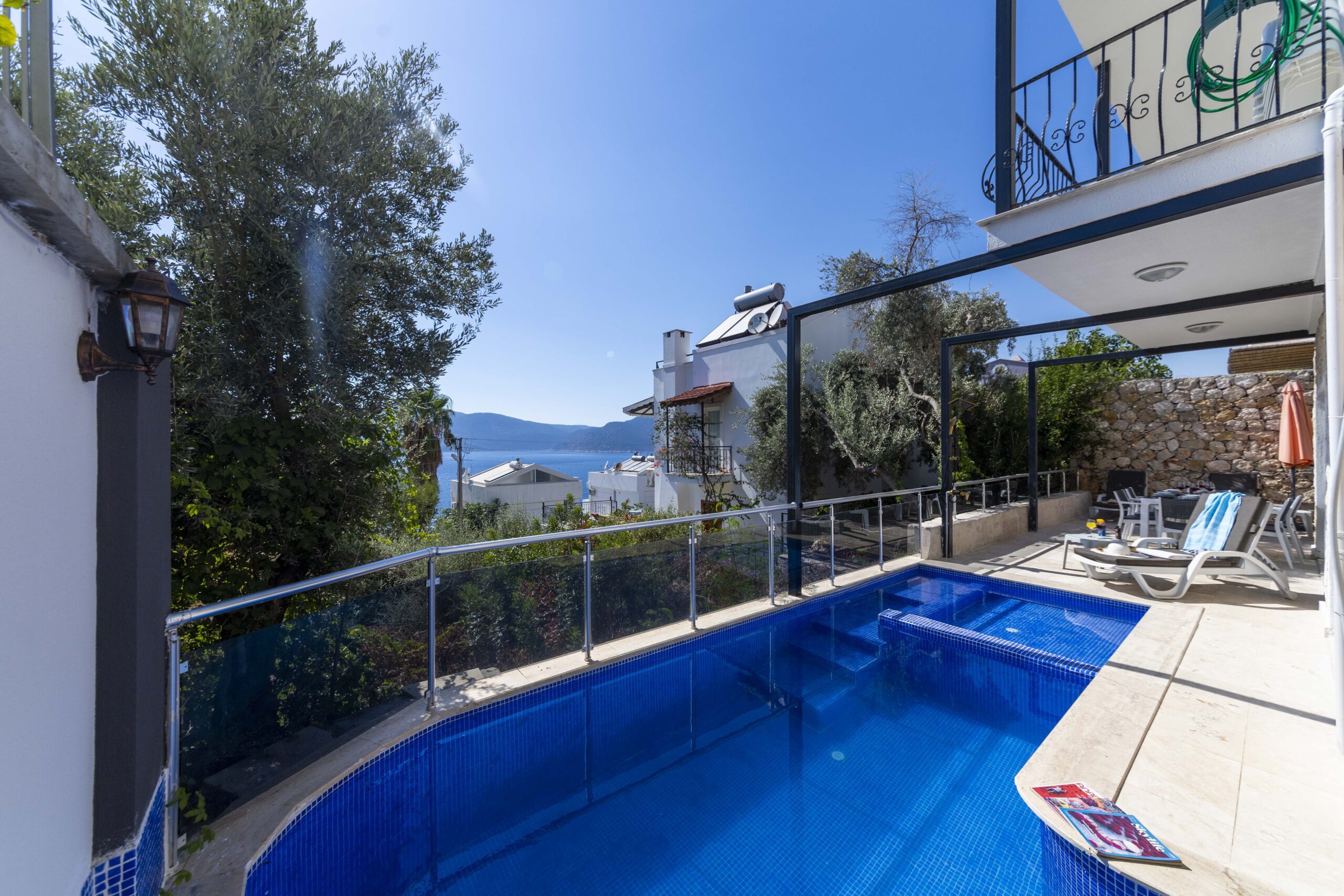 Outdoor pool and sun loungers in Villa Happy, villa holiday in Kalkan, Turkey