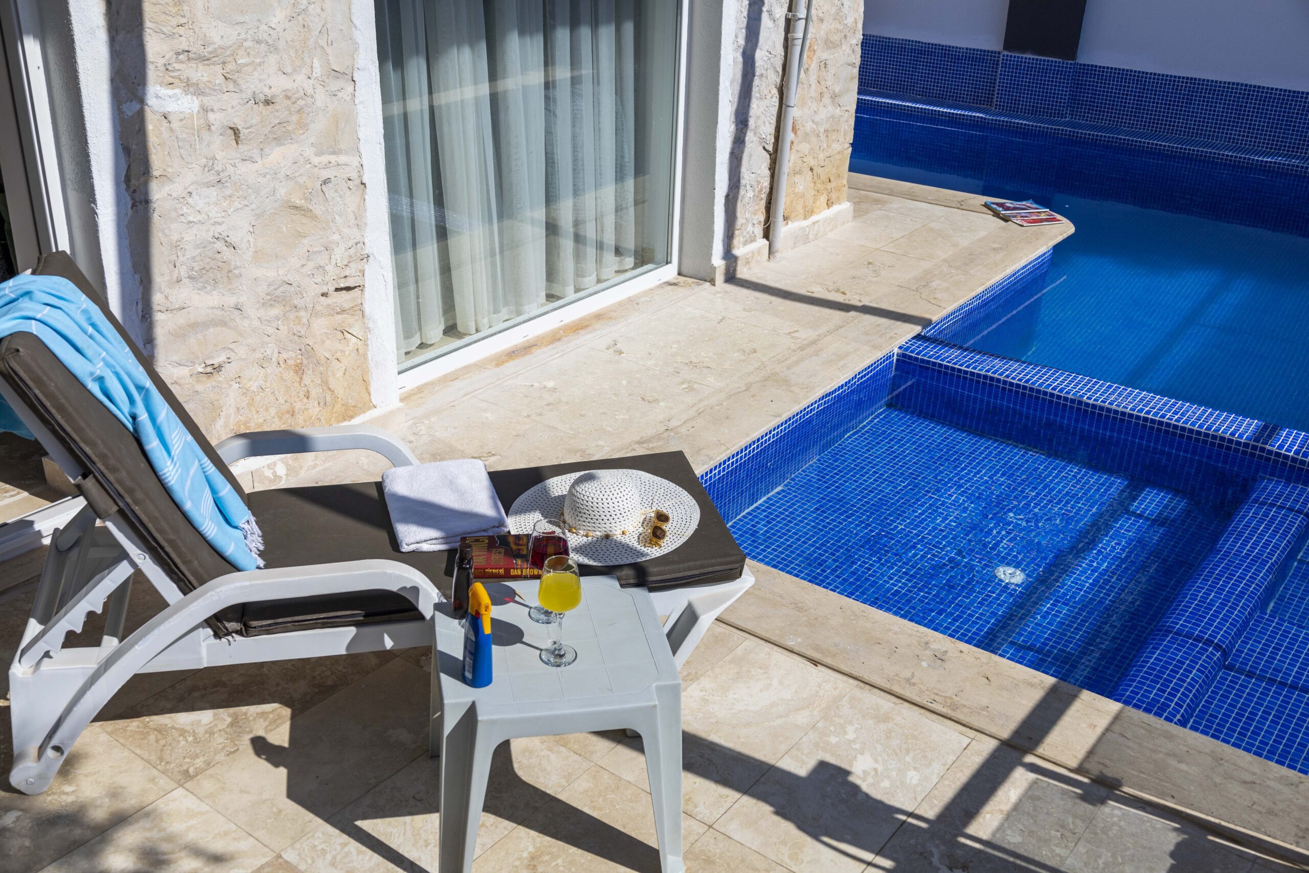 Outdoor pool and sun loungers in Villa Happy, villa holiday in Kalkan, Turkey