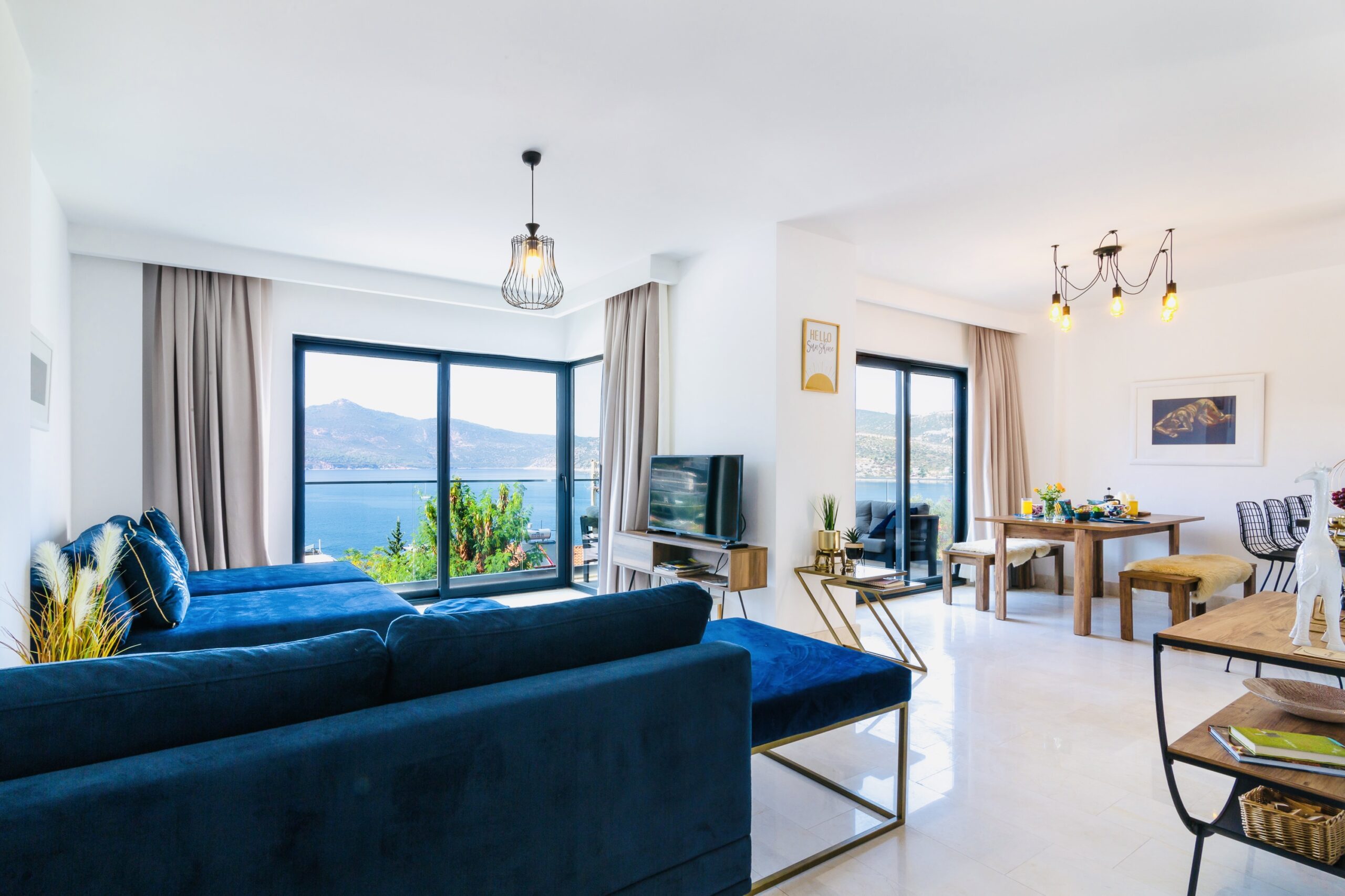 Open-planned lounge and kitchen in Villa Kisla Falls, villas to rent in Kalkan, Turkey