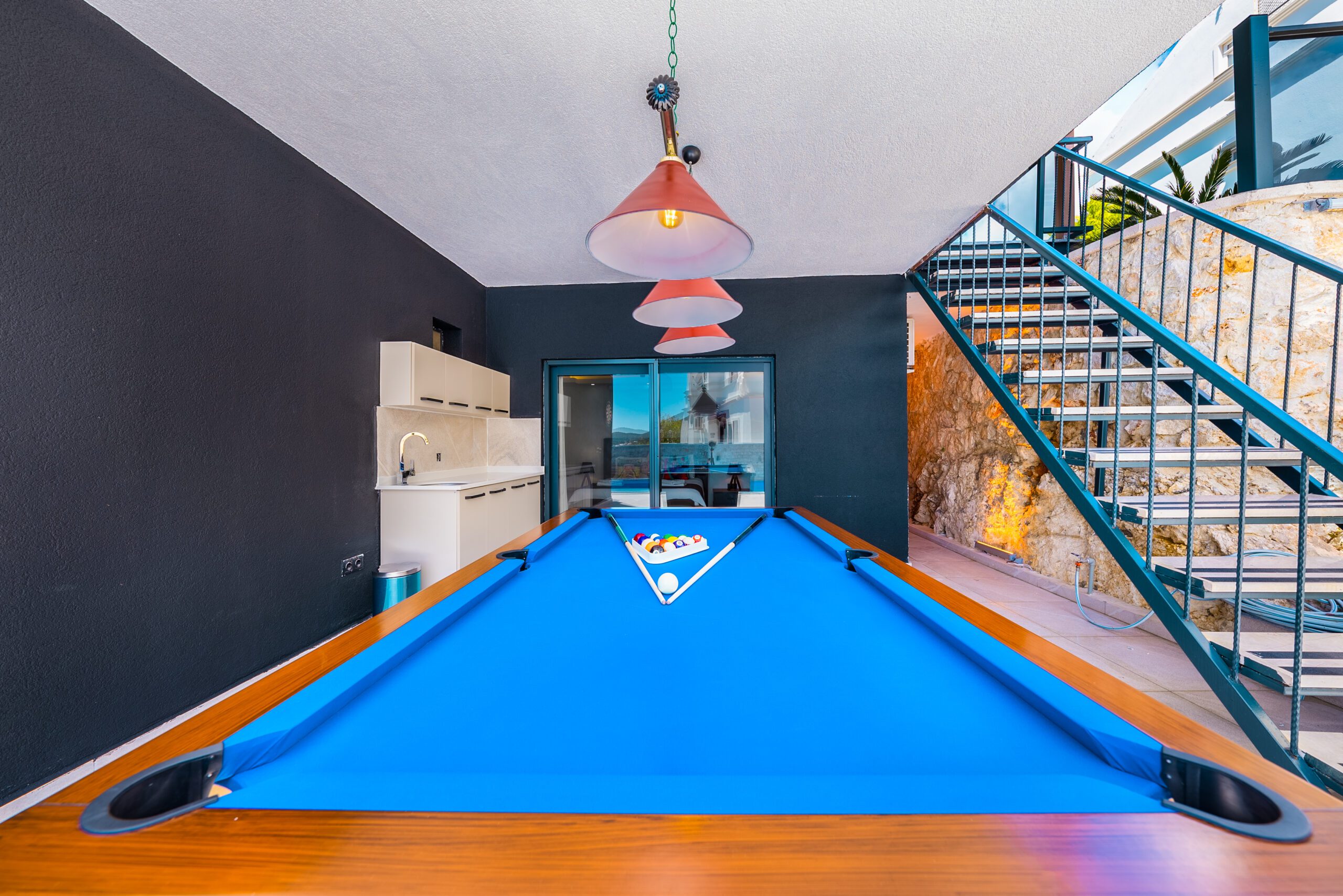 Outdoor kitchen and pool table in Villa Tekin, villa holidays in Kalkan, Turkey