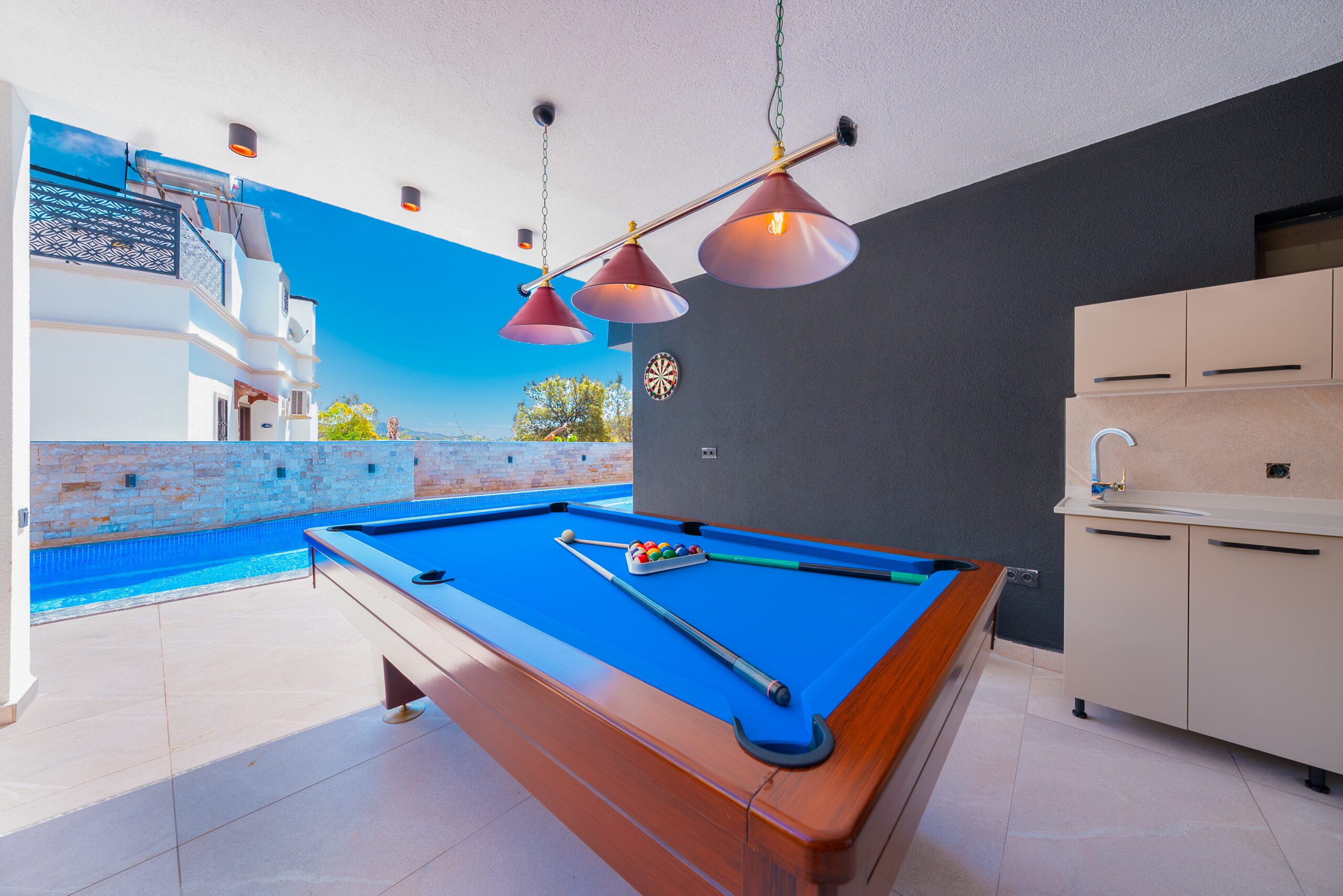 Outdoor kitchen and pool table at Villa Tekin, villa holidays in Kalkan, Turkey