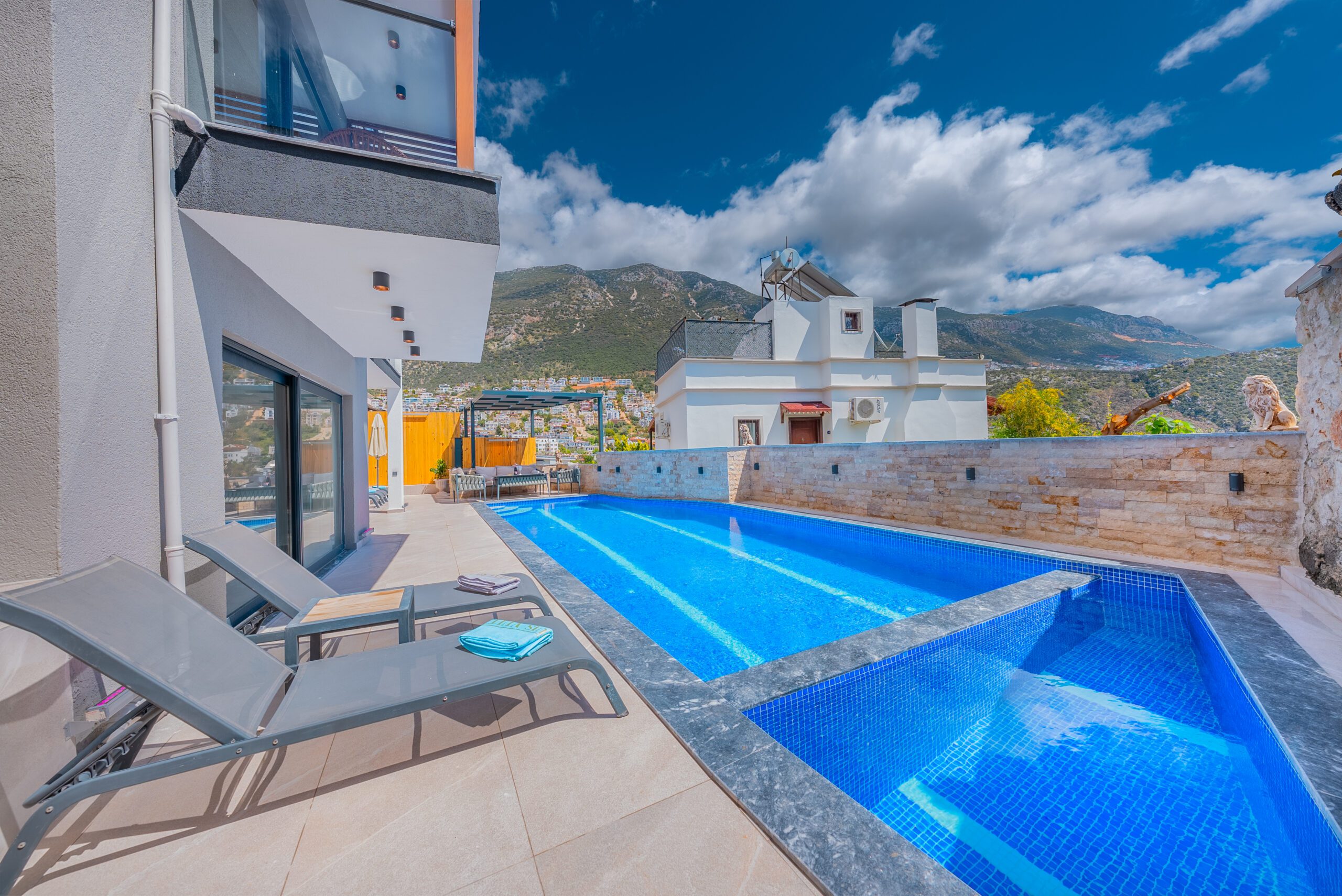 Outdoor pool and sun loungers at Villa Tekin, villa holidays in Kalkan, Turkey