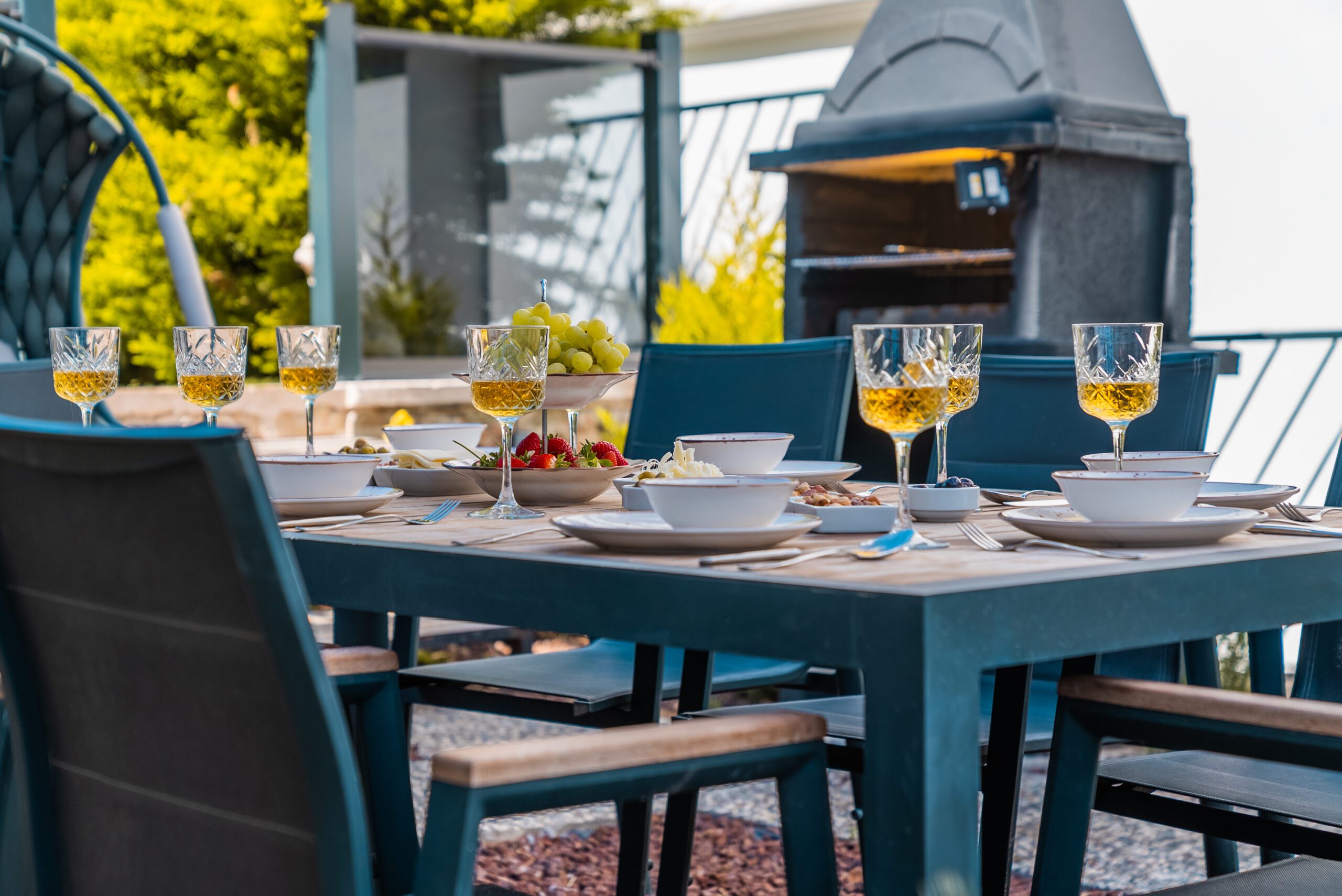 Outdoor dining table and BBQ at Villa Tekin, villa holidays in Kalkan, Turkey