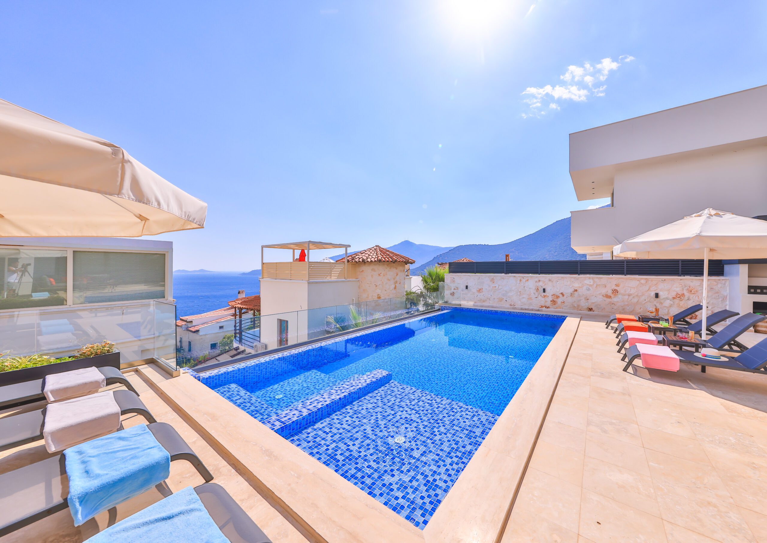 Outdoor pool and sun loungers at Villa Sura, holiday villas to rent in Kalkan, Turkey