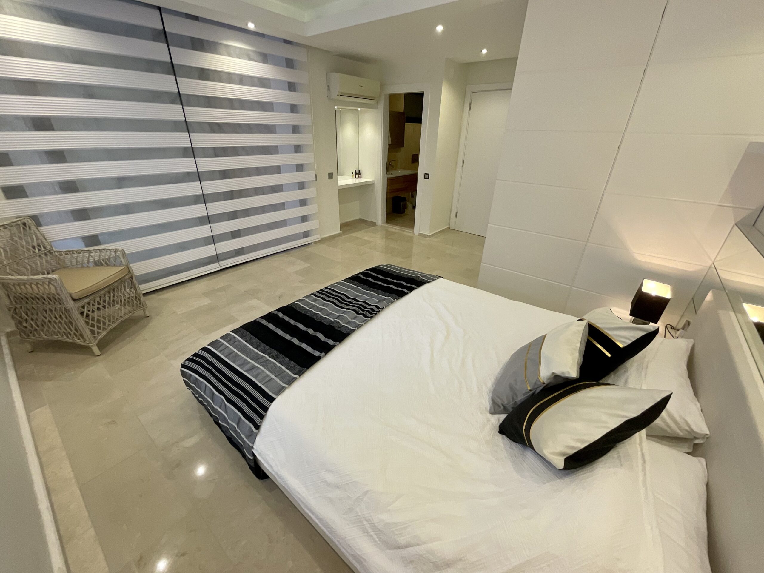 Double bedroom and bathroom in Villa Calypso, villa holidays in Kalkan, Turkey