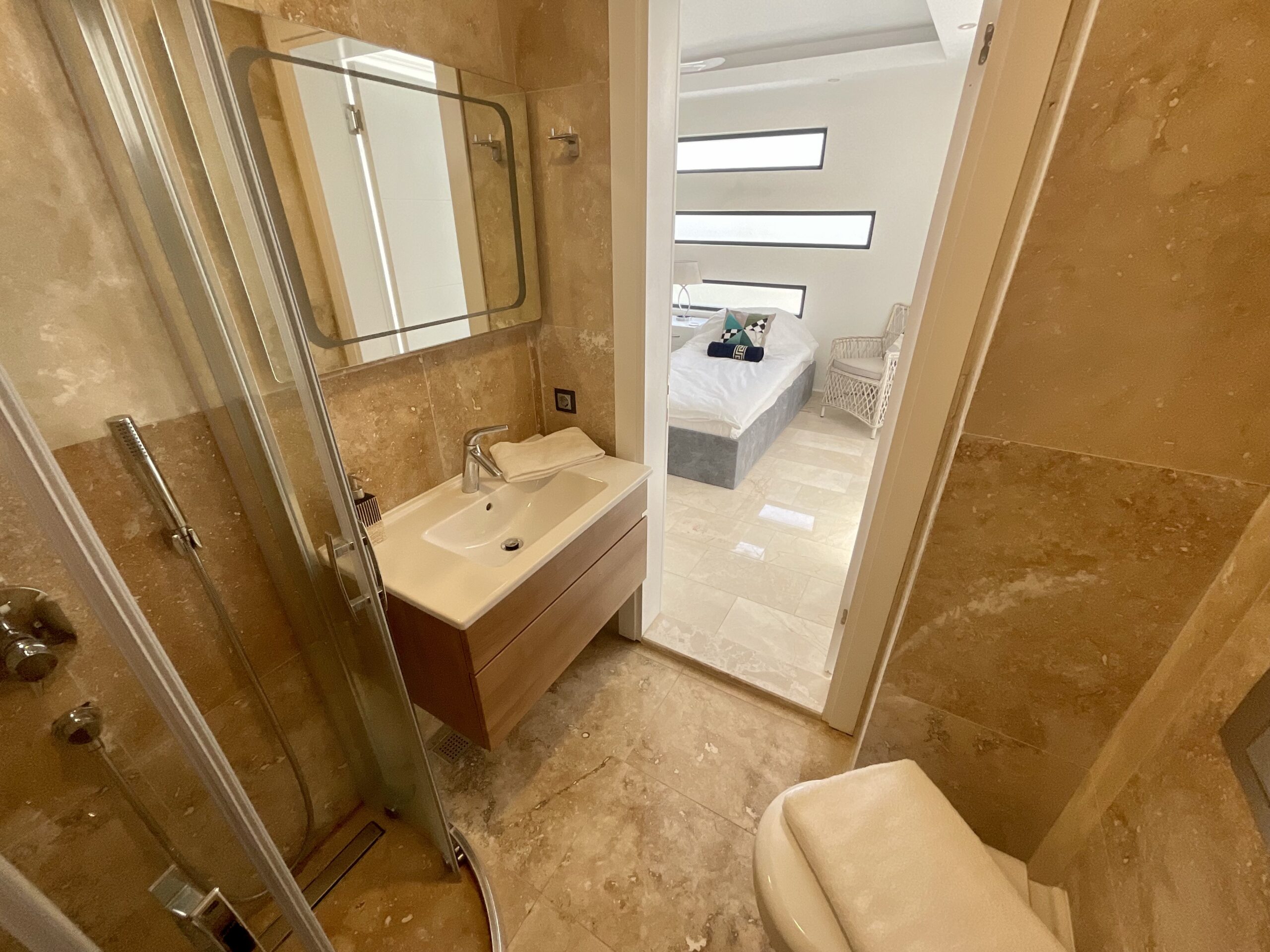 Twin bedroom with en suite bathroom in Villa Calypso, villa holidays in Kalkan, Turkey