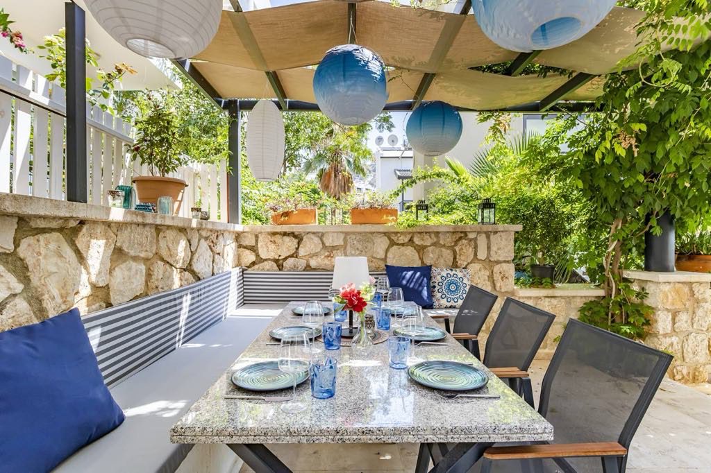 Outdoor dining area at Villa Kisla Falls, villas to rent in Kalkan, Turkey