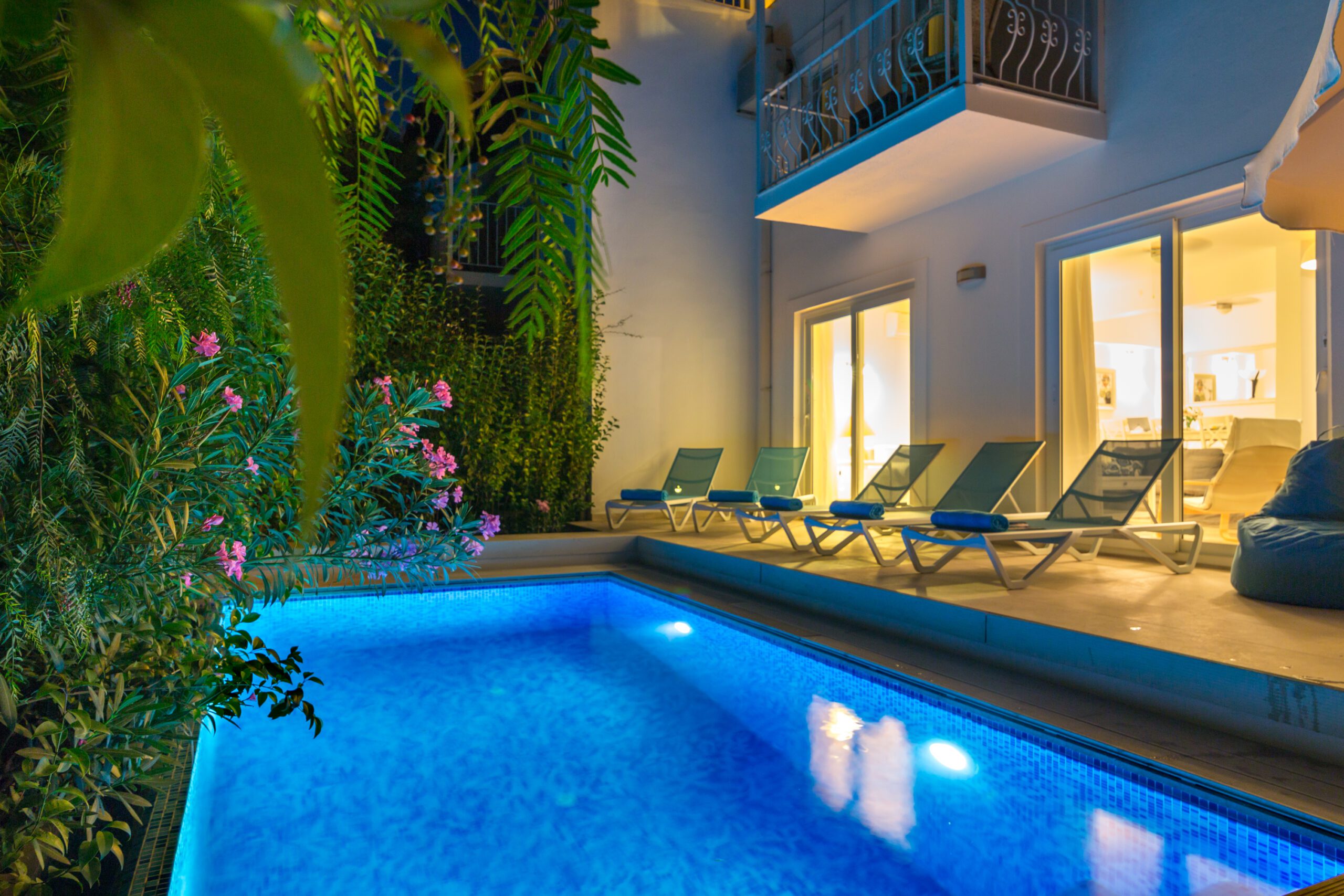 Outdoor pool with sun loungers at Villa Amelia, villas to rent in Kalkan, Turkey