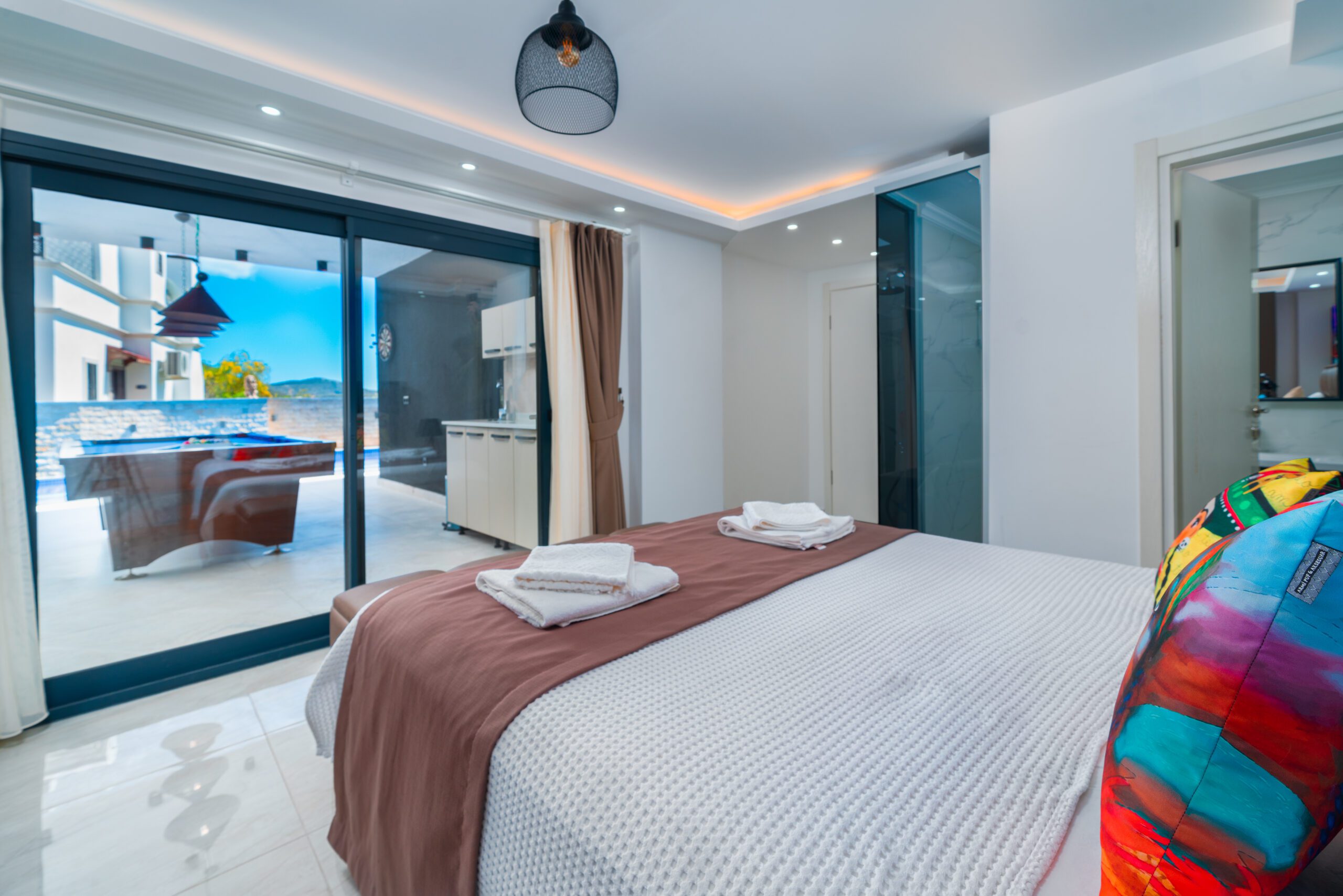 Double bedroom and bathroom with garden access in Villa Tekin, villa holidays in Kalkan, Turkey