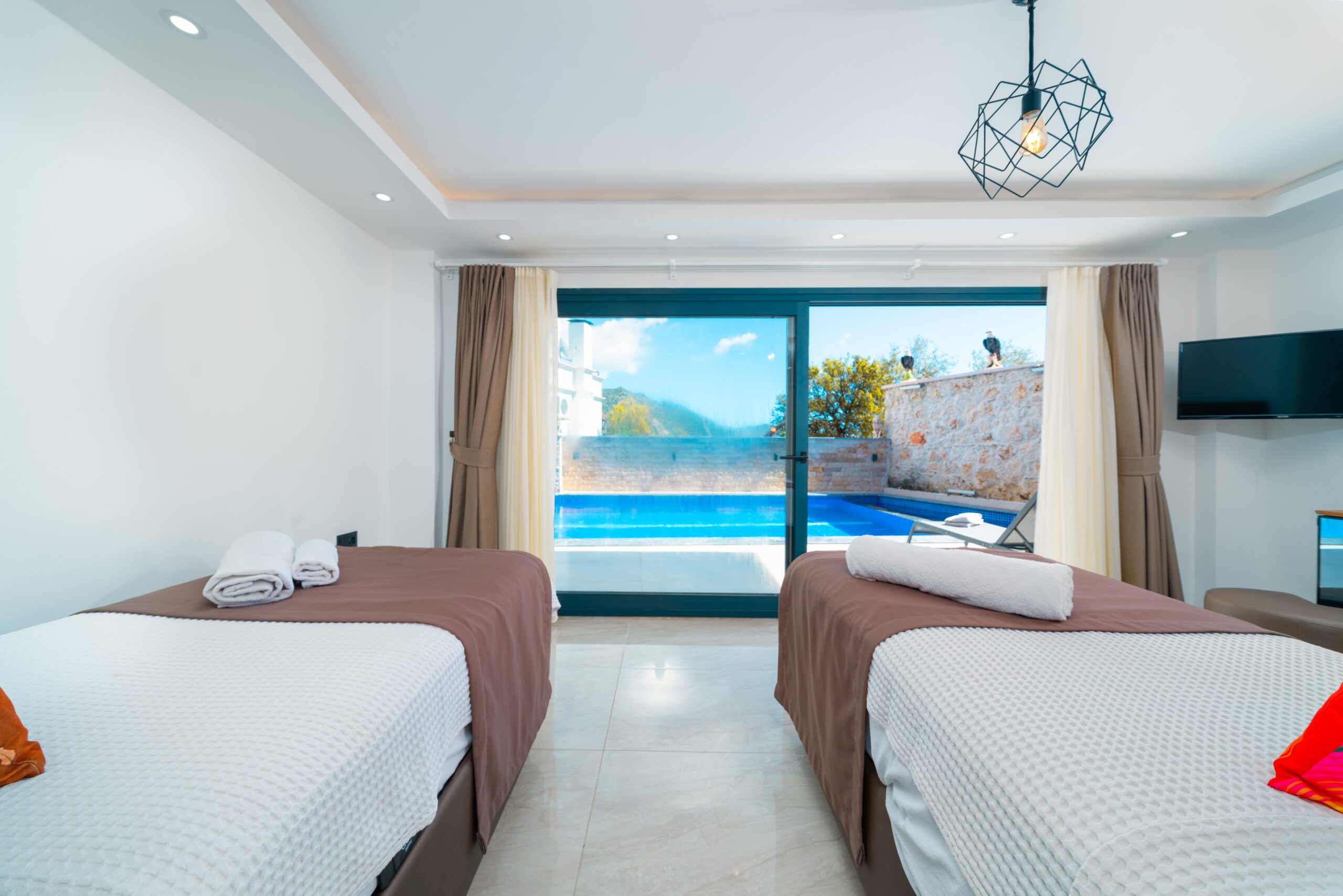 Twin bedroom with garden access in Villa Tekin, villa holidays in Kalkan, Turkey