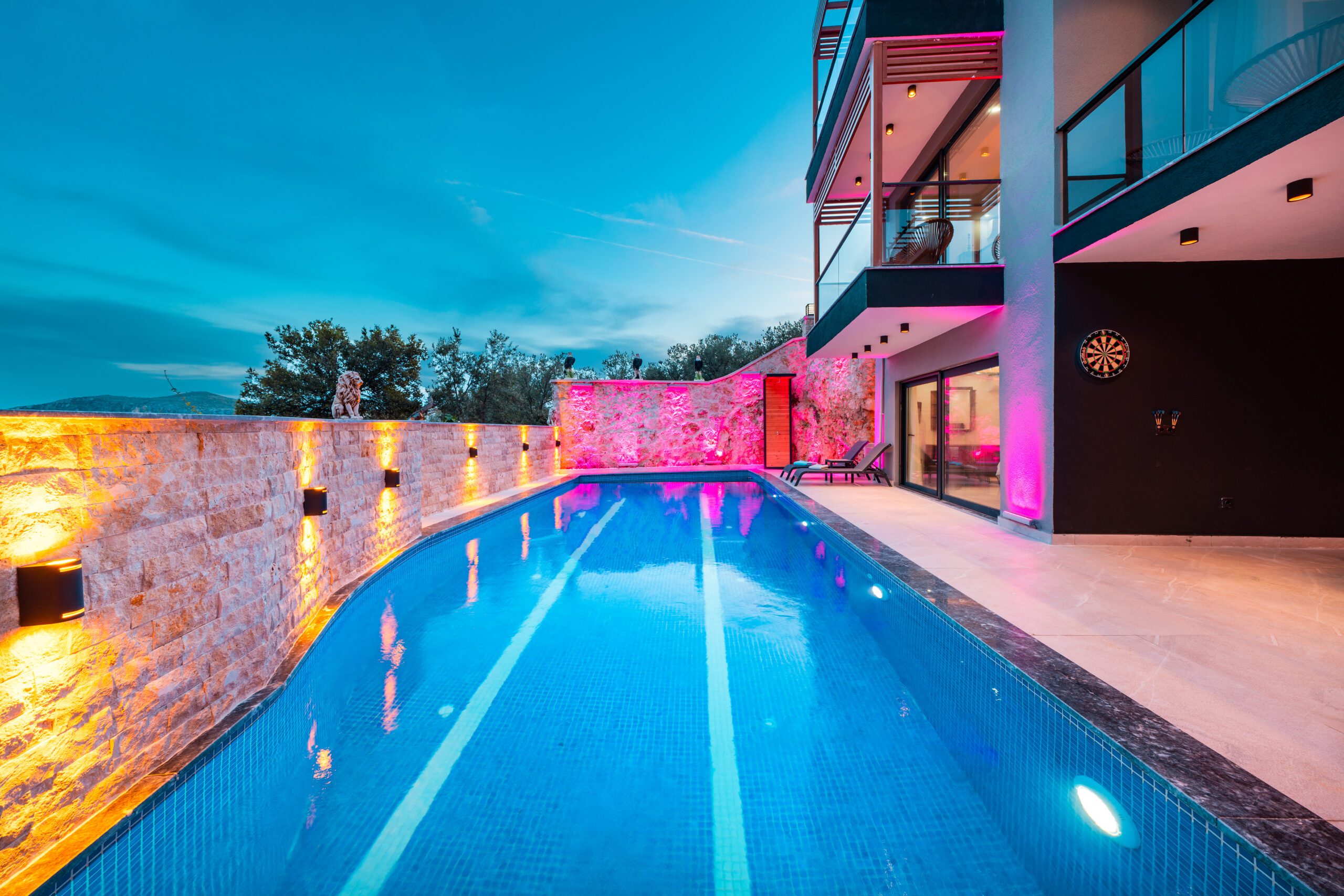 Outdoor pool with sun loungers at Villa Tekin, villa holidays in Kalkan, Turkey