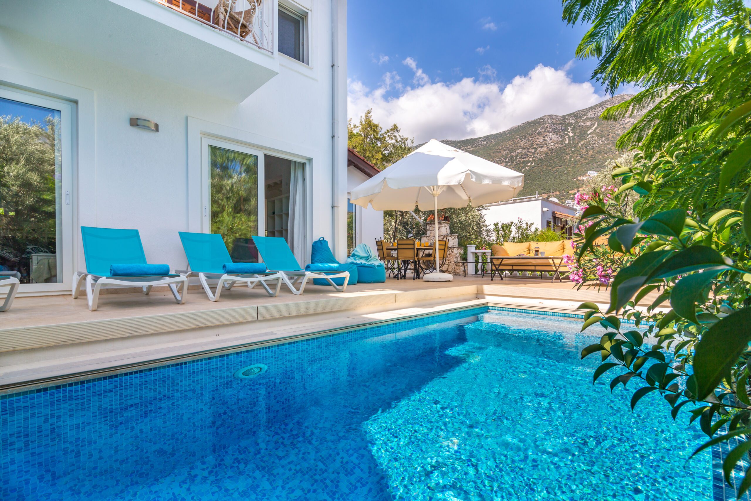 Outdoor pool with sun loungers in Villa Amelia, villas to rent in Kalkan, Turkey