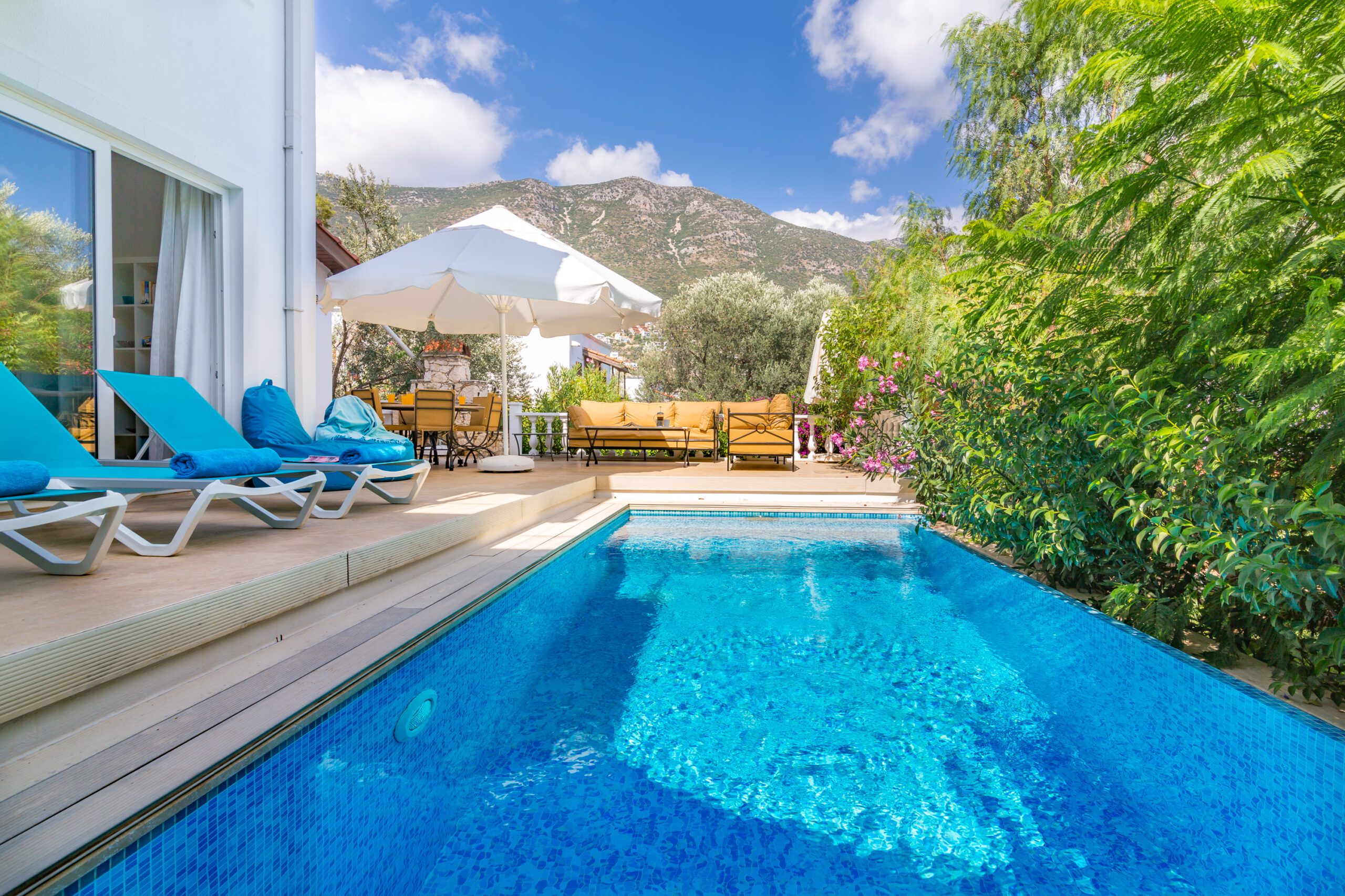 Outdoor pool with sun loungers in Villa Amelia, villas to rent in Kalkan, Turkey