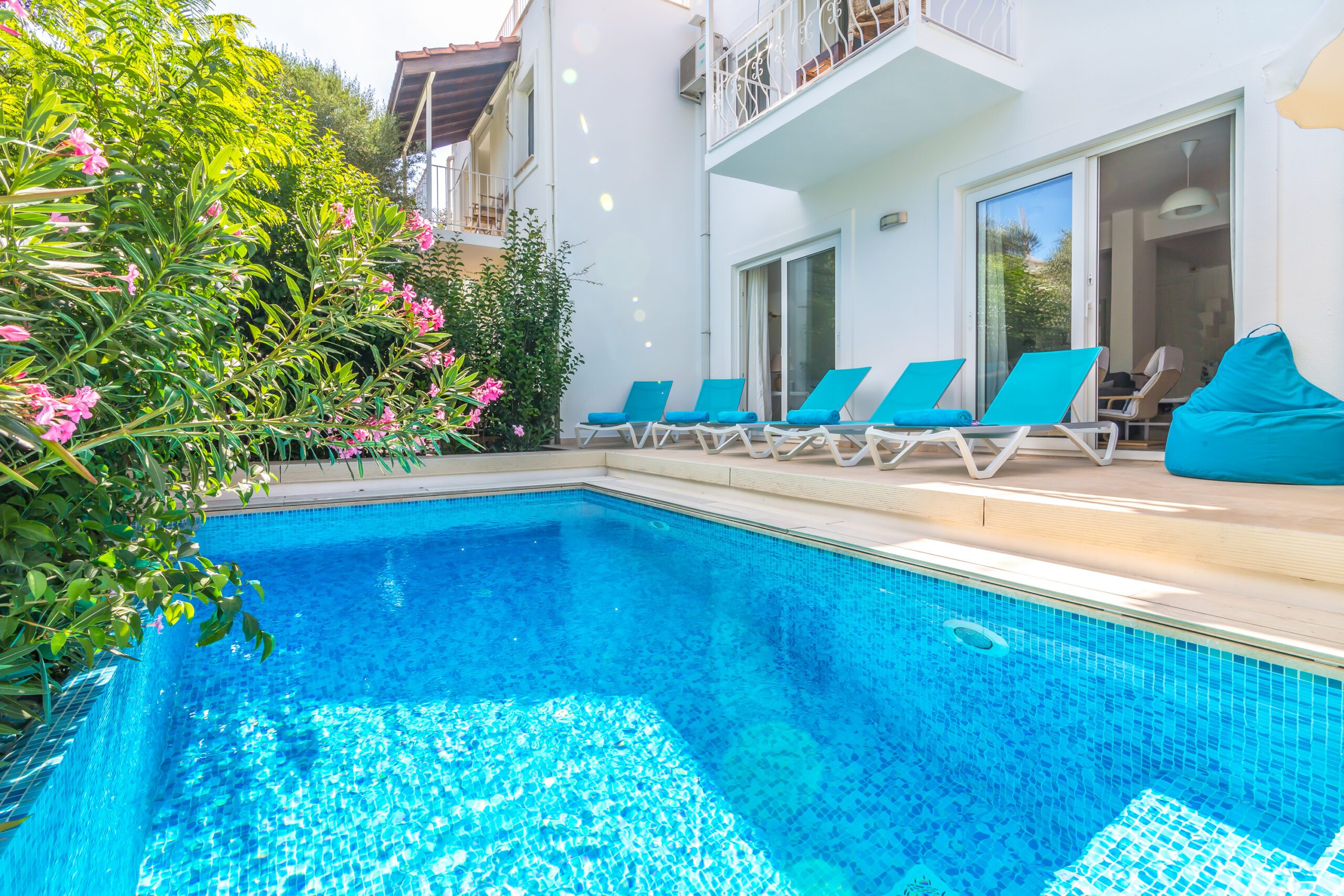 Outdoor pool with sun loungers in Villa Amelia, villas to rent in Kalkan, Turkey