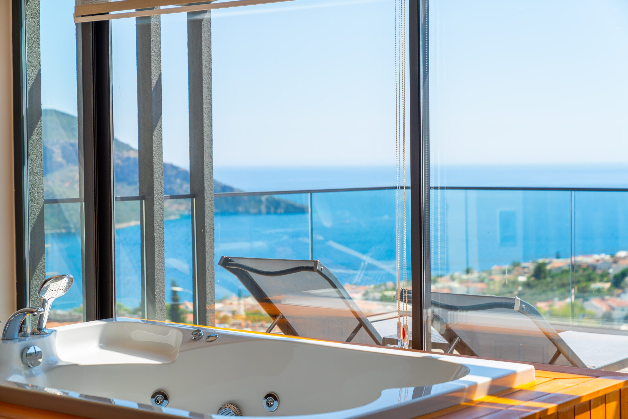 Luxurious double bedroom with hot tub and balcony at Villa Nova, villa holidays in Kalkan, Turkey