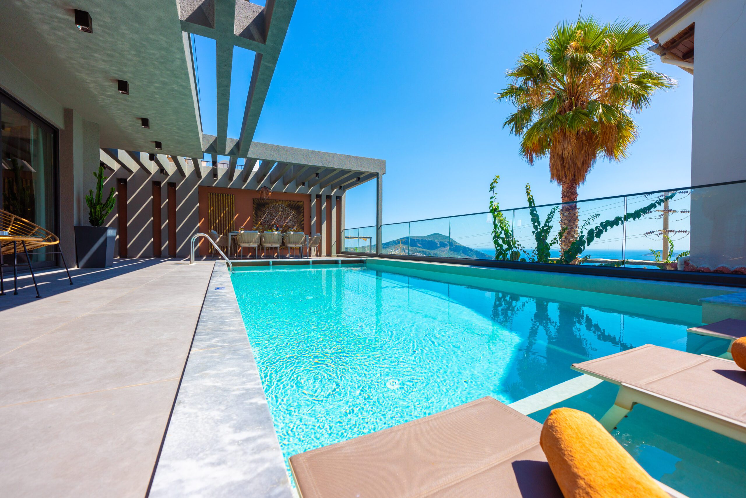 Outdoor pool and sun loungers at Villa Nova, villa holidays in Kalkan, Turkey