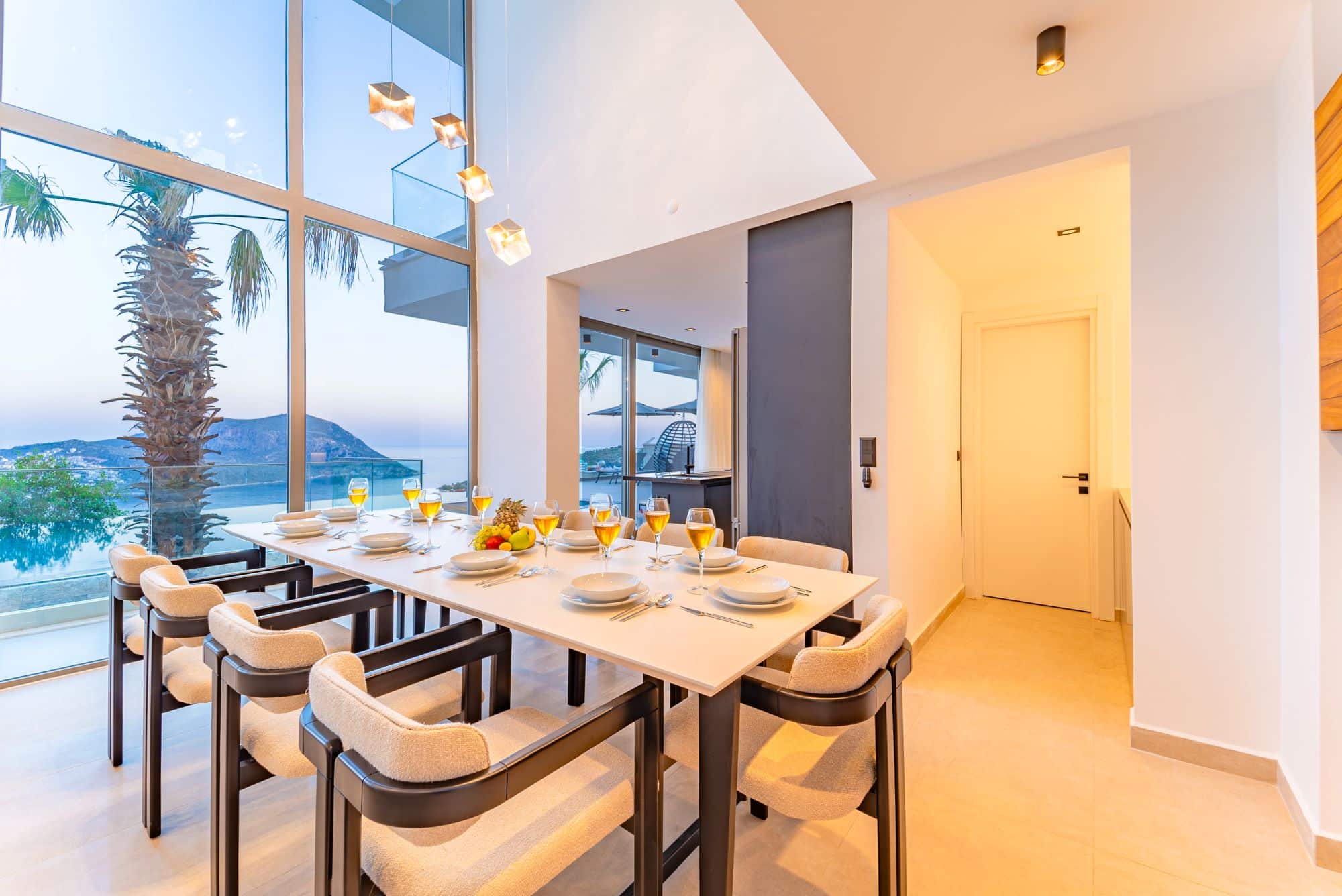 Open-planned kitchen and dining area at Villa Nobles Rox, villa holidays in Kalkan, Turkey