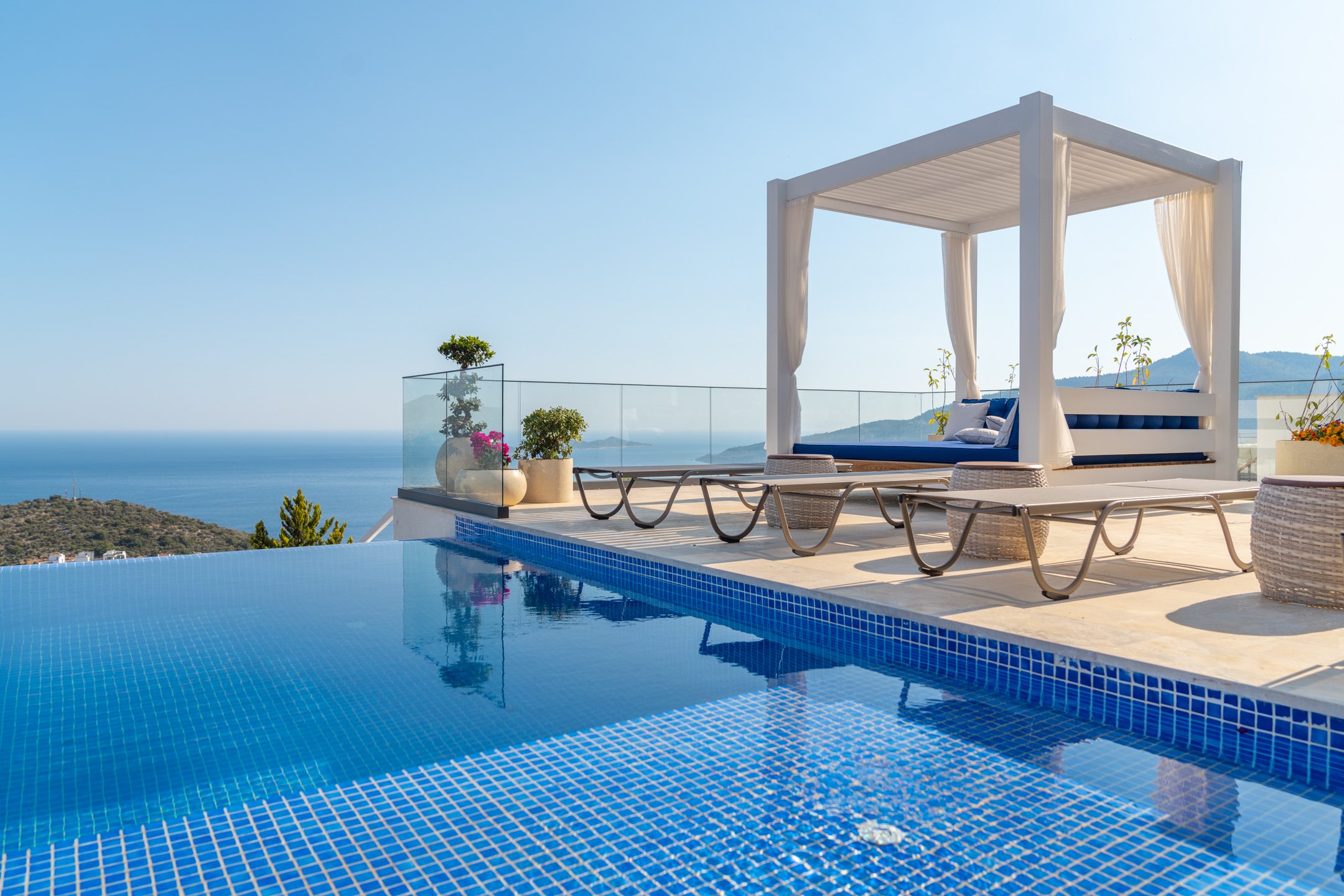 Outdoor infinity pool with sun bed at Villa Anatolia 3, villas to rent in Kalkan, Turkey