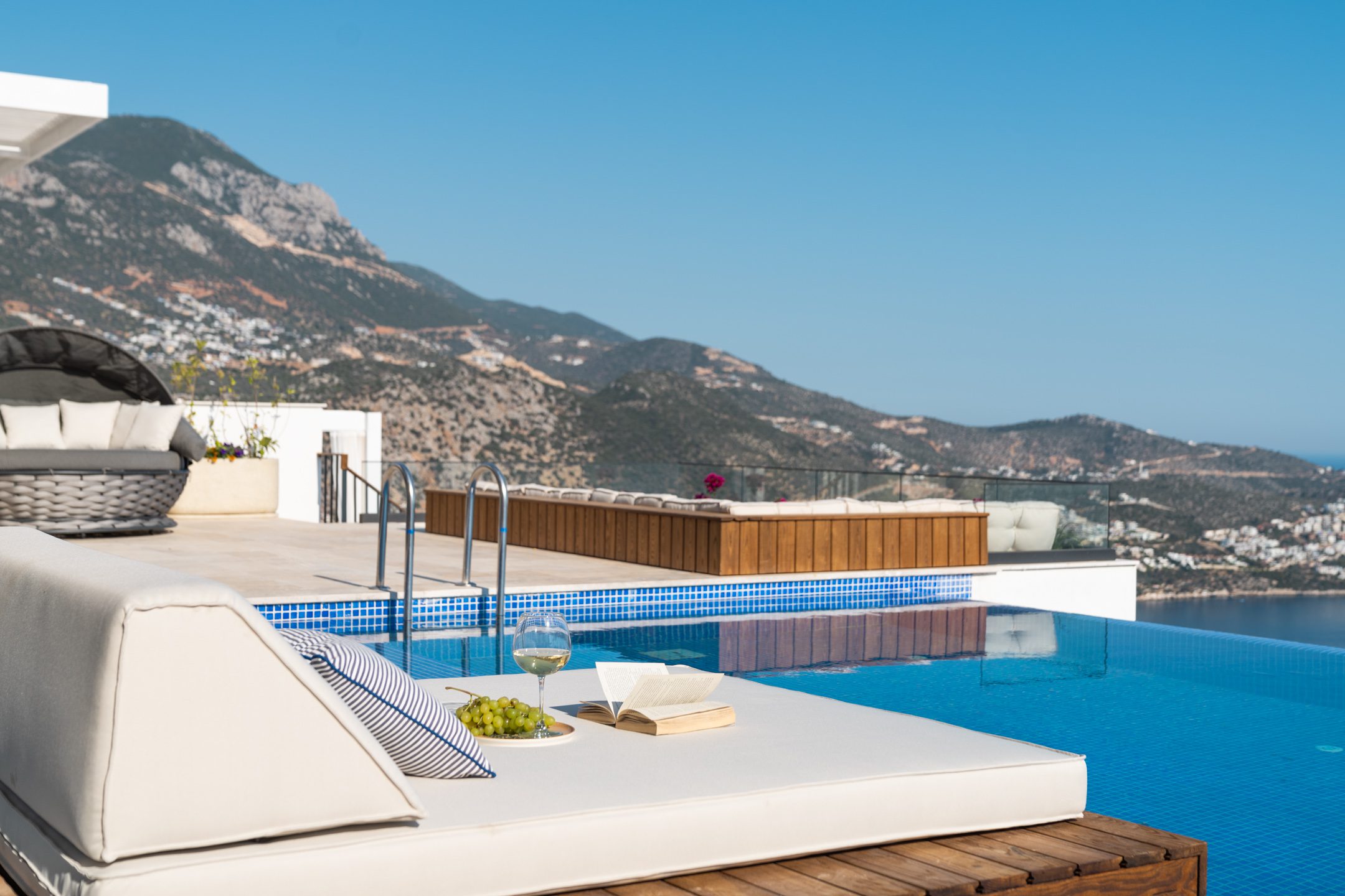 Outdoor infinity pool with sun beds at Villa Anatolia 3, villas to rent in Kalkan, Turkey